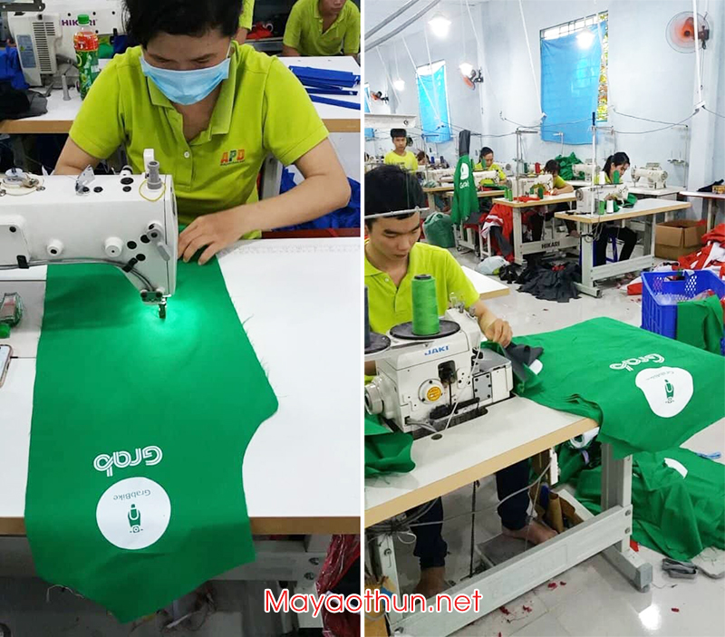 công nhân may áo gió grab và uber